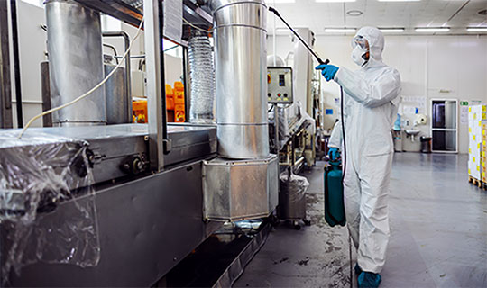 Cleaning a production facility